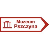 E-9 Drogowskaz do muzeum. Wskazuje kierunek do obiektu turystycznego lub wypoczynkowego wskazanego na znaku
